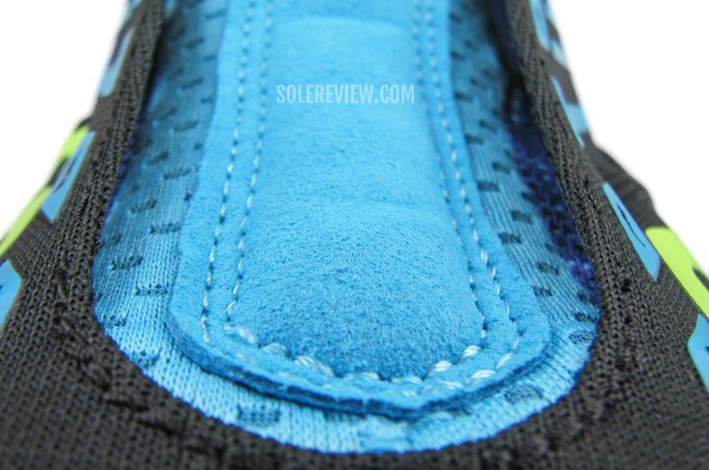 The soft suede tongue of the Saucony Kinvara 12.