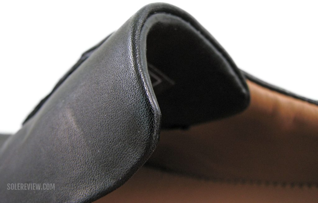 The folded and padded tongue of the Clarks Un Tailor Tie.