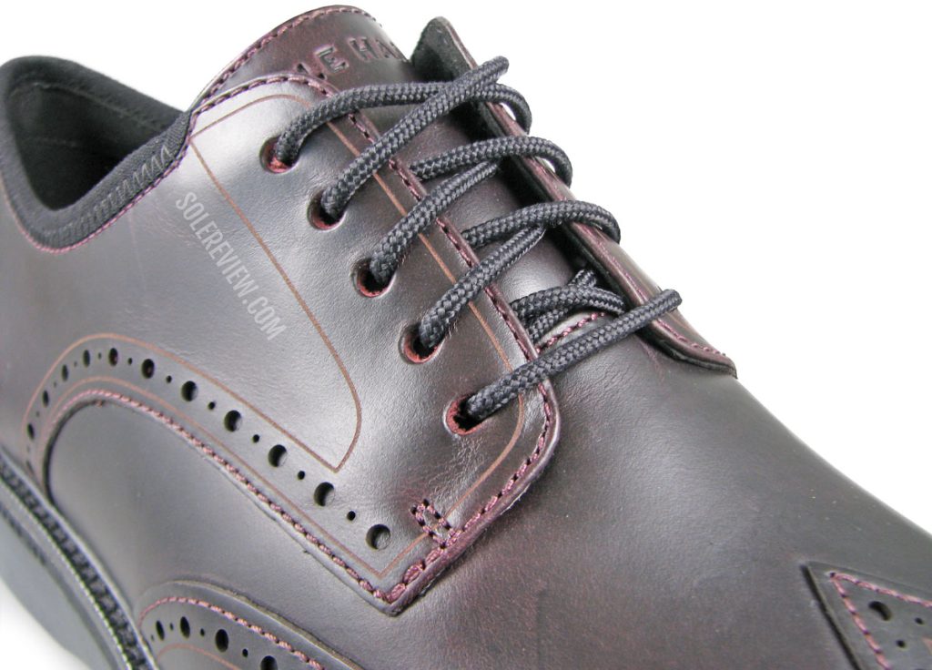 The laces of the Cole Haan Grand Ambition Wingtip Oxford
