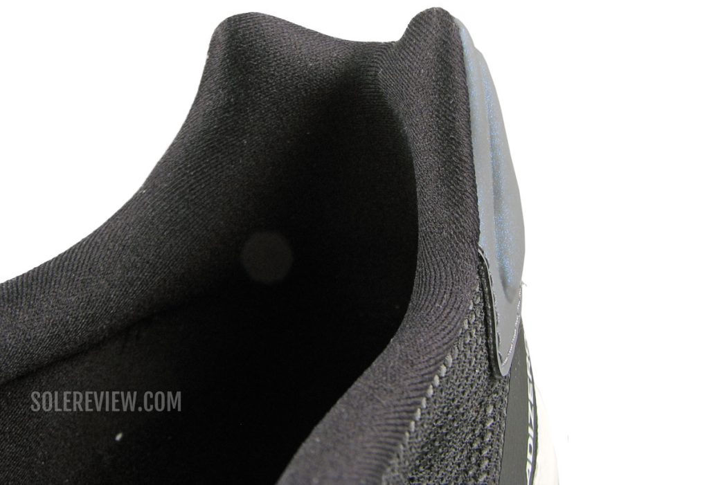The padded heel collar of the adidas adios 6.