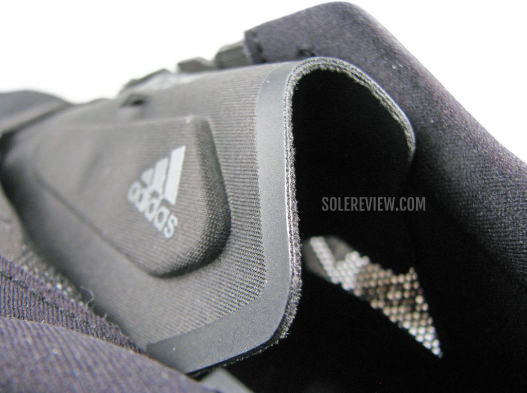 The asymmetrical tongue of the adidas adios 6.