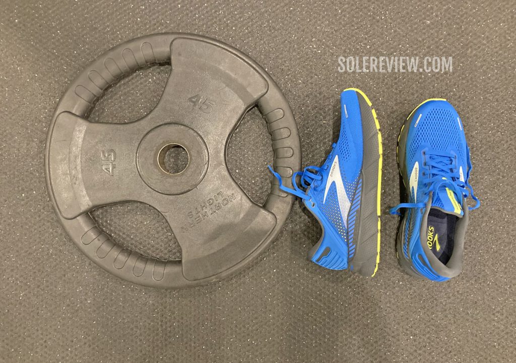 The Brooks Adrenaline GTS 22 with gym weights