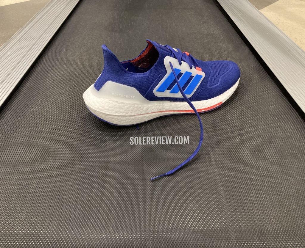 The adidas Ultraboost 22 inside a gym.