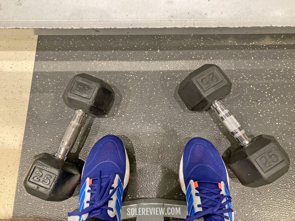 The adidas Ultraboost 22 inside a gym.