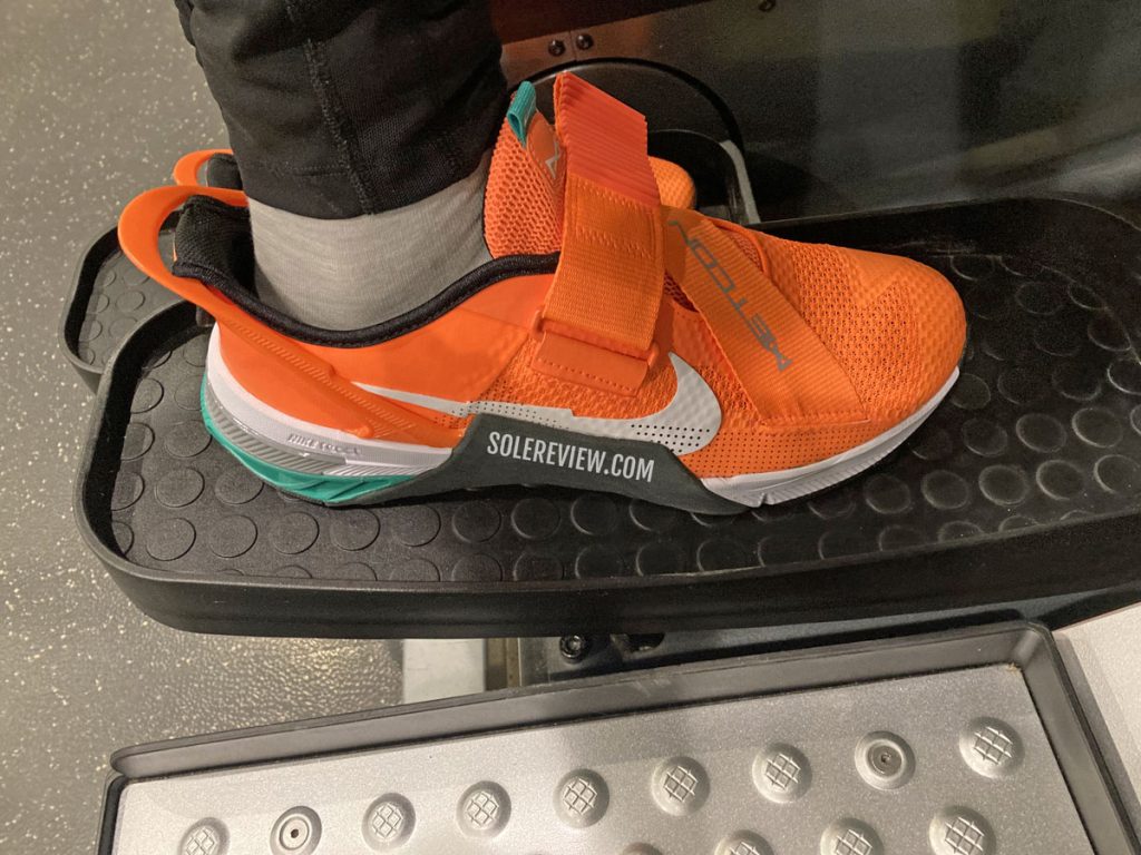 The Nike Metcon 7 Flyease on a stairmaster.