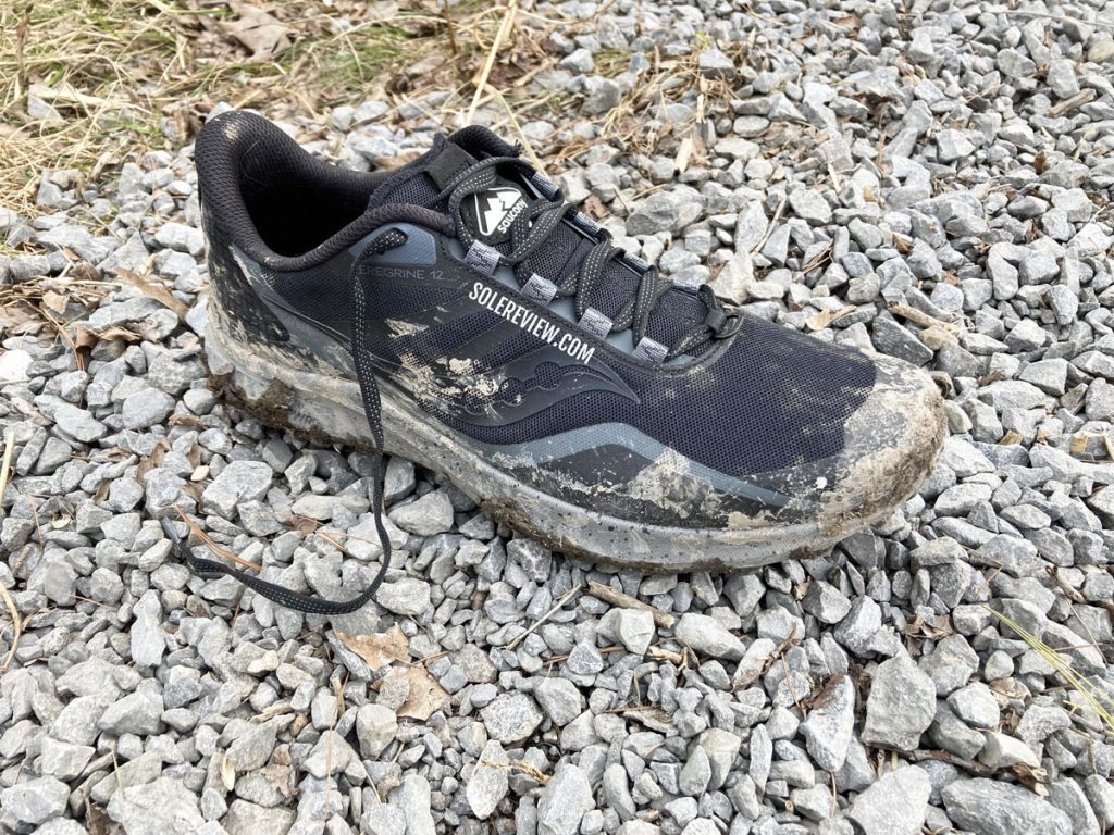 The Saucony Peregrine 12 on rocky gravel.