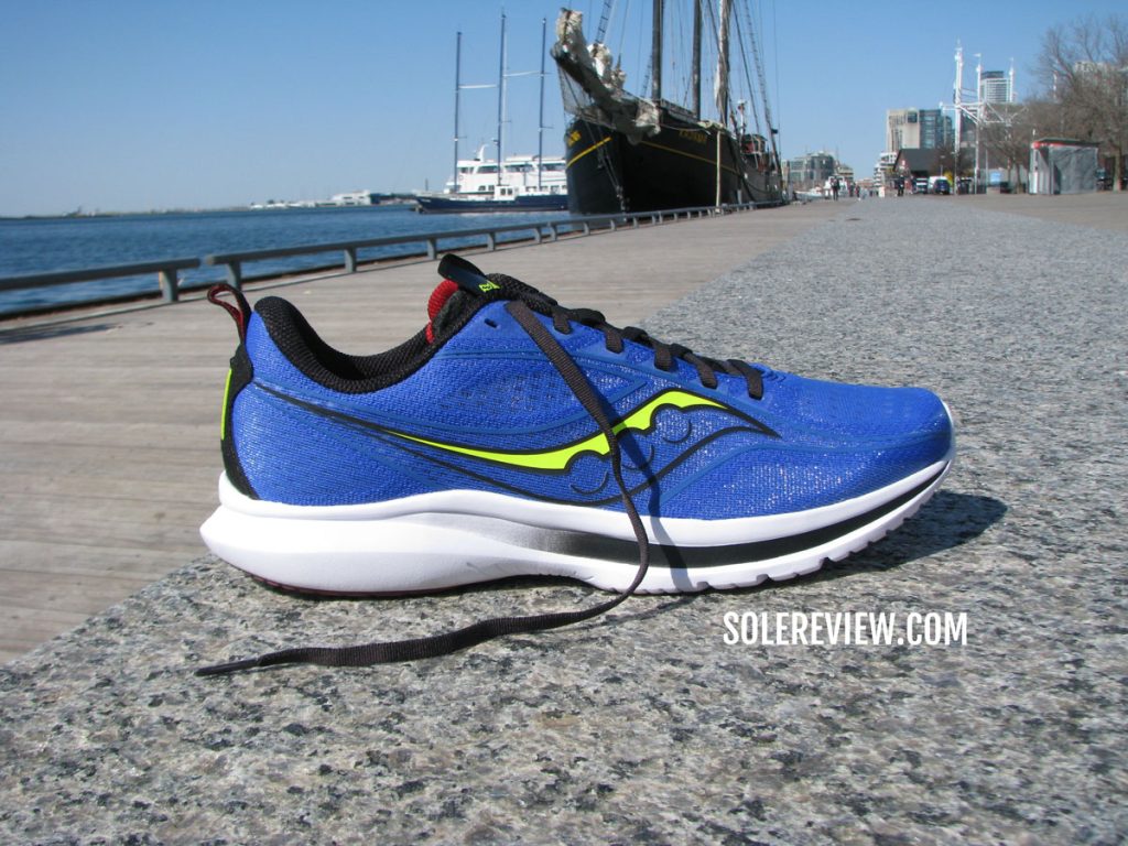 The Saucony Kinvara 13 in an outdoors settings.