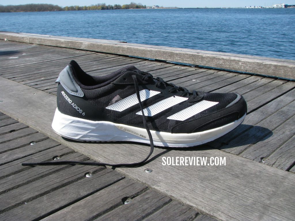 The adidas adios 6 on the boardwalk.