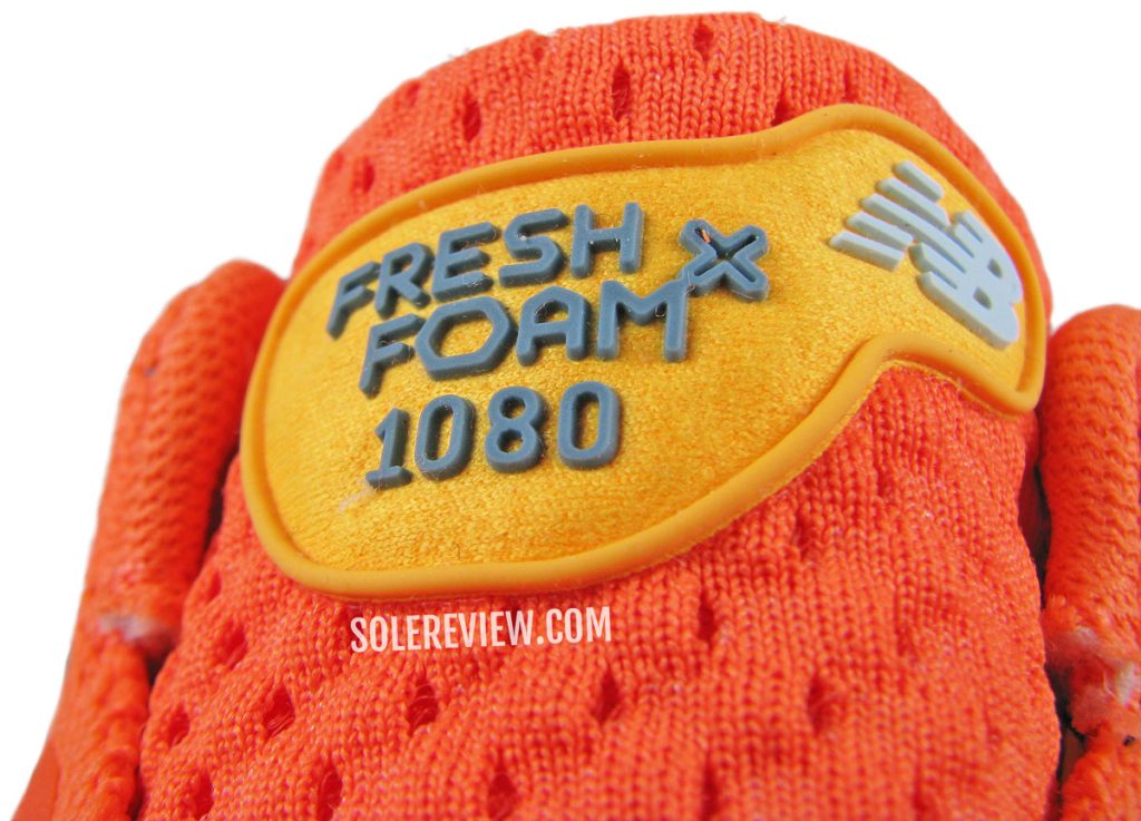 The tongue flap of the New Balance Fresh Foam X 1080 V12.