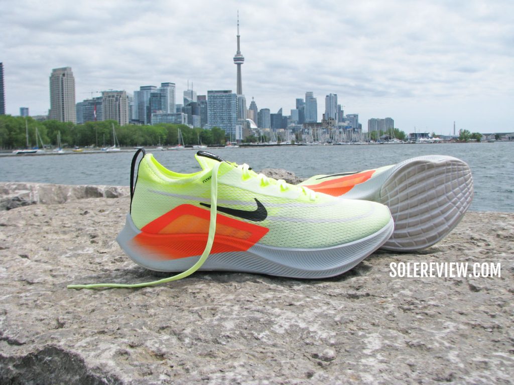 The Nike Zoom Fly 4 near the waterfront.