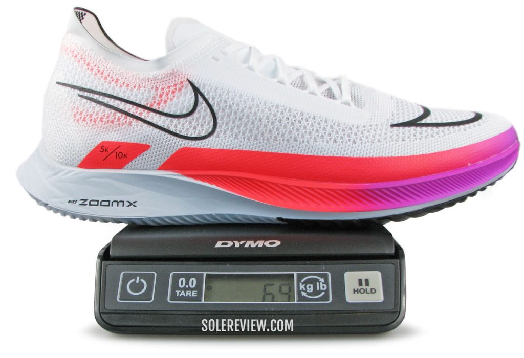 The Nike ZoomX Streakfly on a scale.