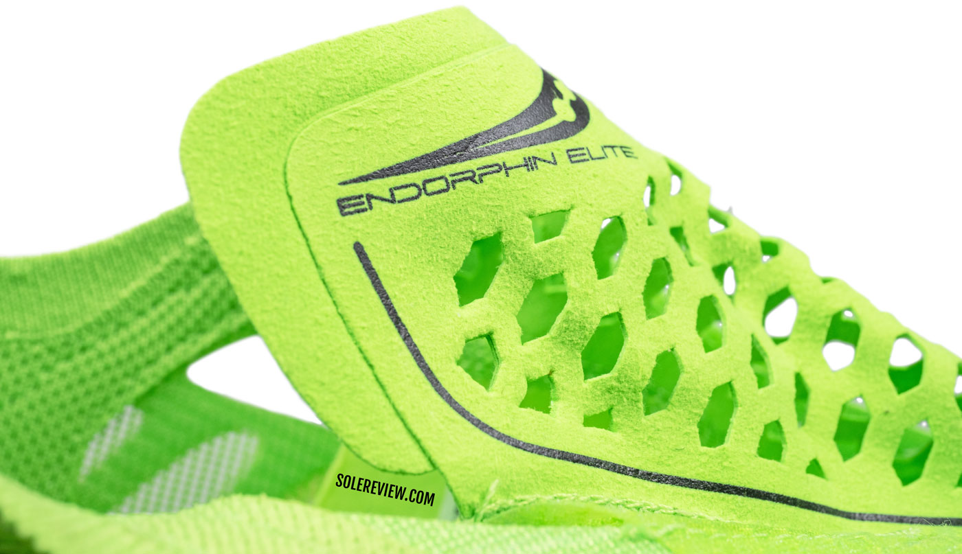 The perforated tongue of the Saucony Endorphin Elite.
