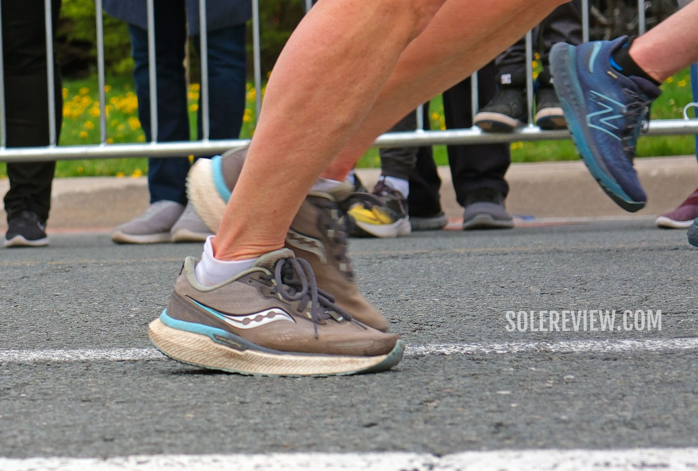The Saucony Triumph 19 on road.
