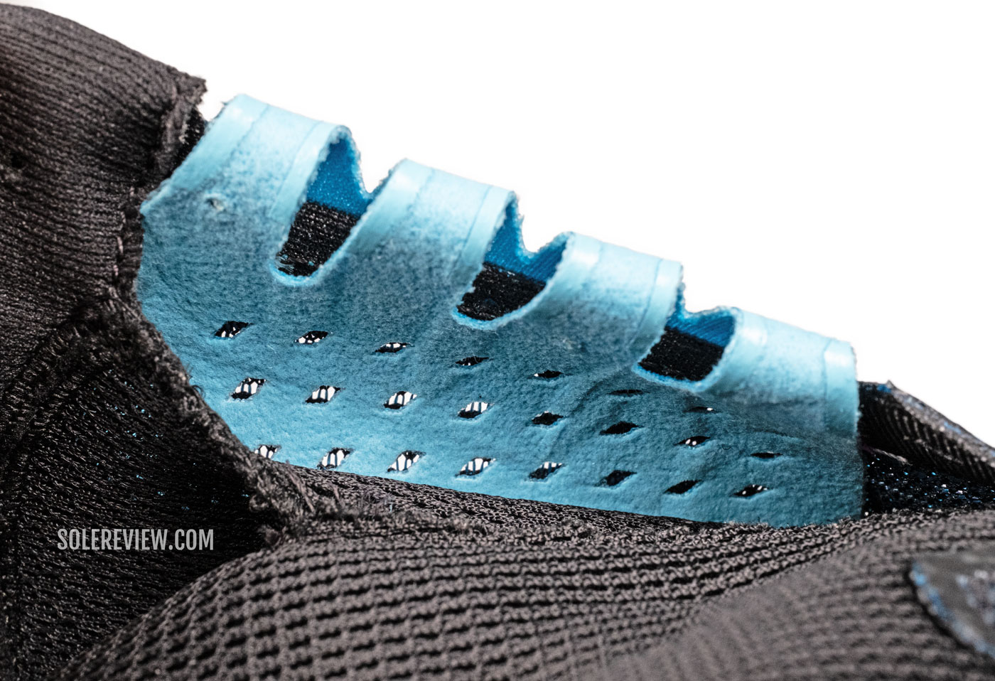 The midfoot strap of the Nike Pegasus 40.