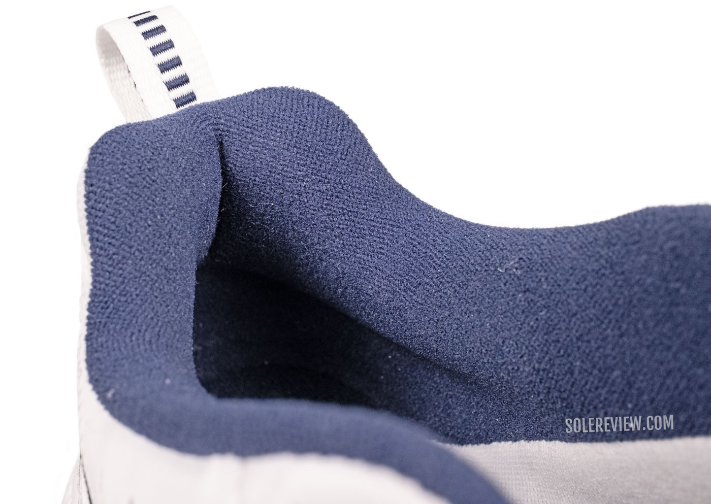The heel collar of the Nike Monarch IV.