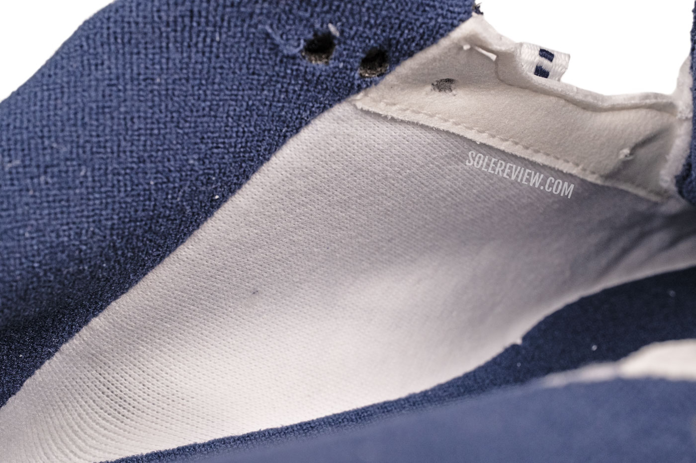 The midfoot lining of the Nike Monarch IV.