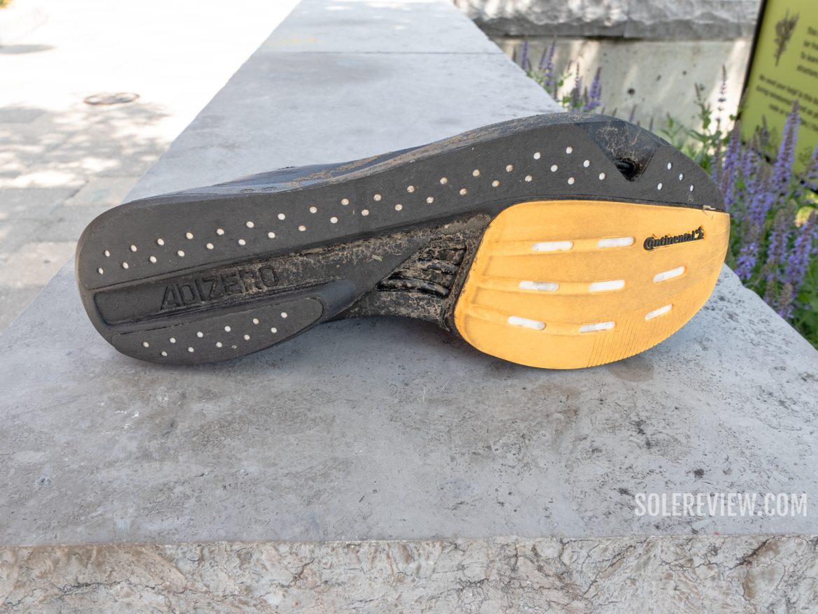The adidas Takumi Sen 10 on a sidewalk.