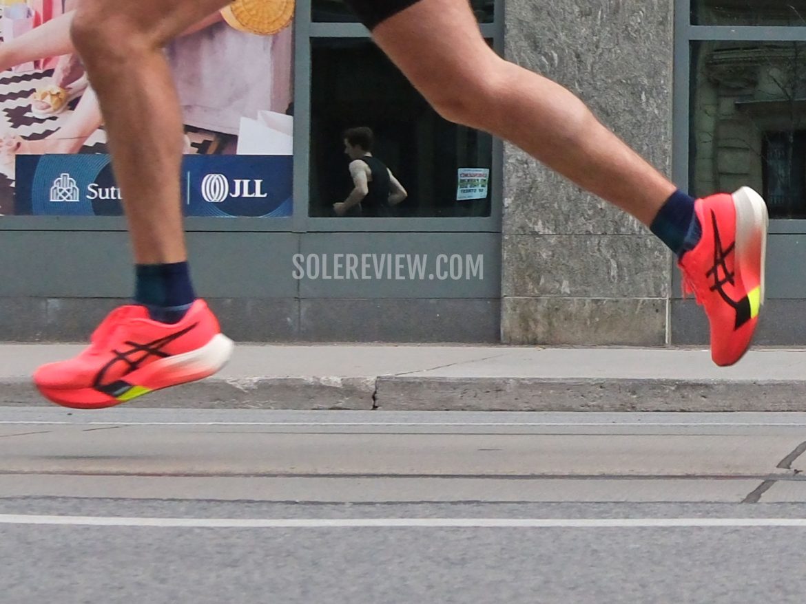 The Asics Metaspeed Edge Paris in a race.