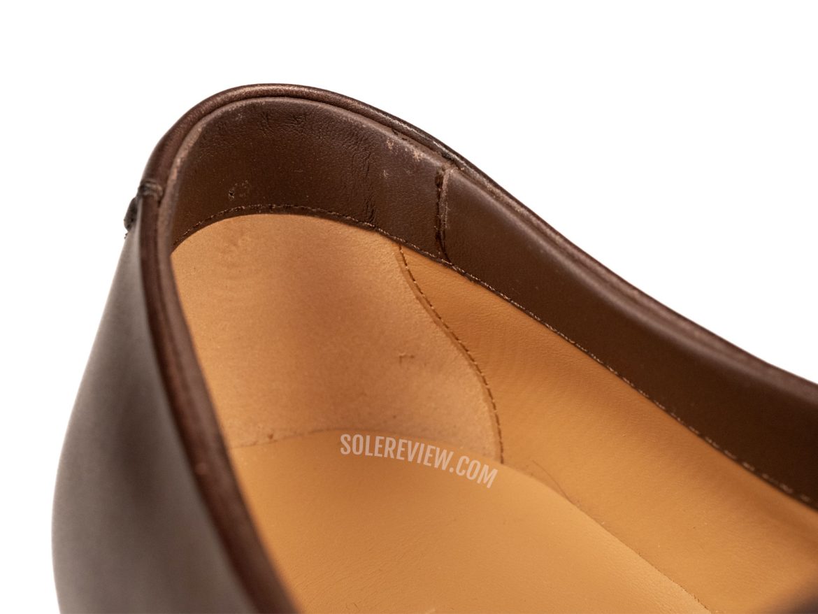 The folded heel collar of the Ferragamo Tramezza Derby.