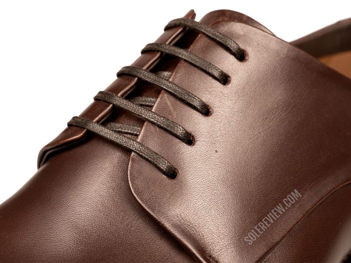 The waxed laces of the Ferragamo Tramezza Derby.