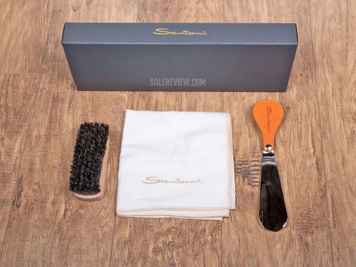 The shoe brush and metal shoe horn with the Santoni Limited Edition shoe.