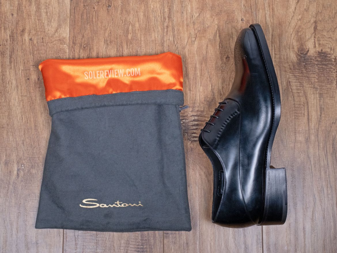The Satin-lined shoe bag of the Santoni Limited Edition shoe.