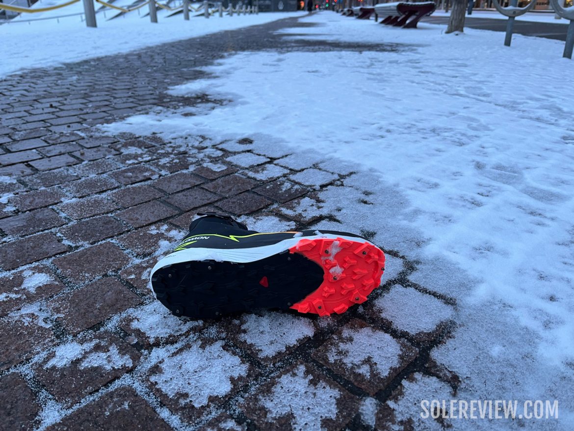 The Salomon Wintercross Spike on icy sidewalks.
