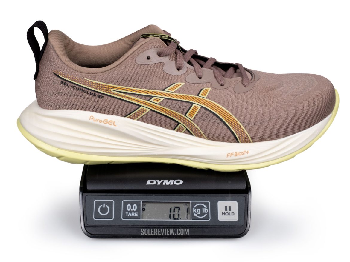 The Asics Cumulus 27 on a scale.