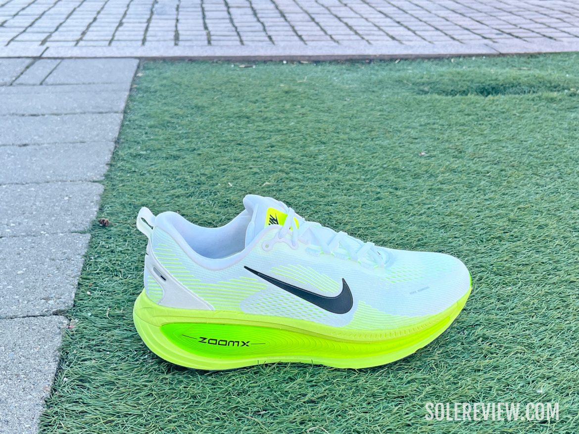 The Nike Vomero 18 on grass.