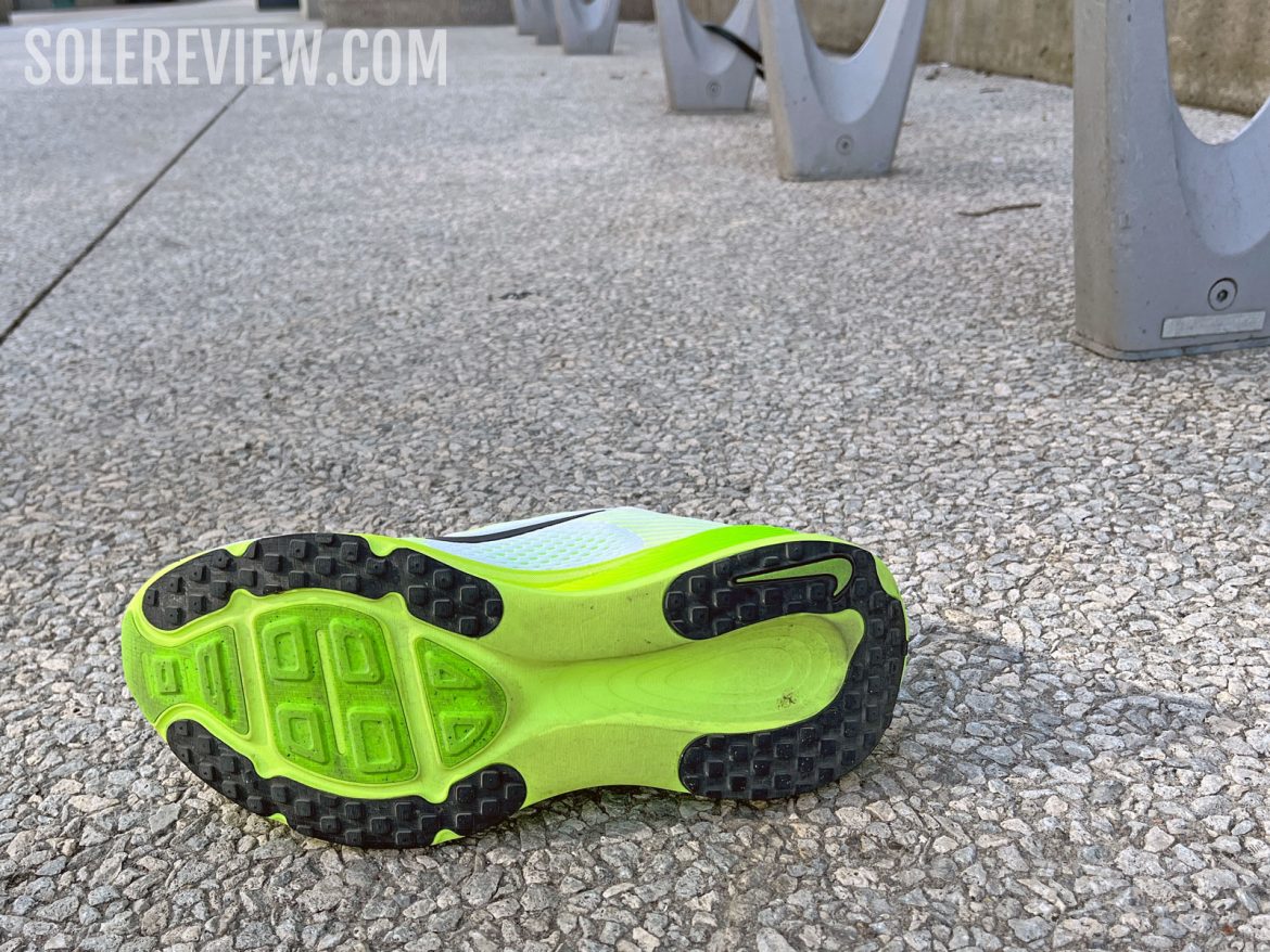 The Nike Vomero 18 on pavement.