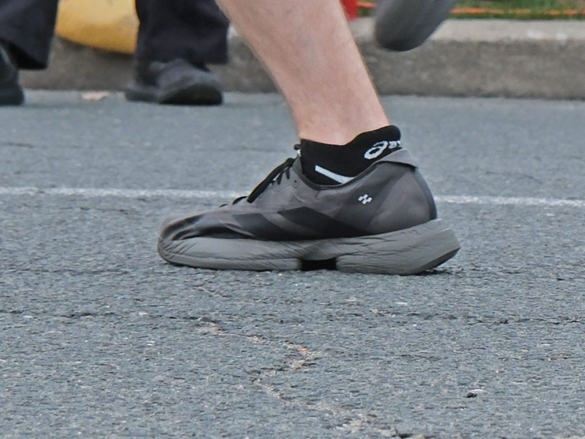 Adidas_Adios_Pro_4_black_on_road_1 Black adidas Adios Pro 4 on the road.