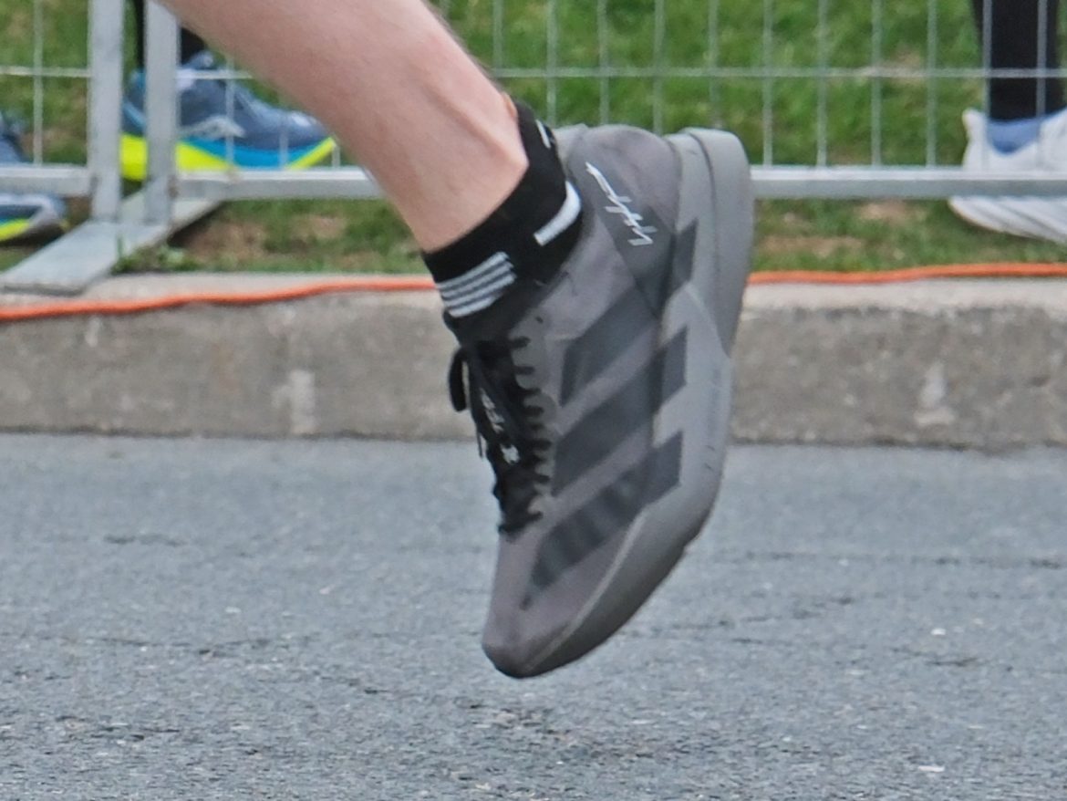 Adidas_Adios_Pro_4_black_on_road_3 Black adidas Adios Pro 4 on the road.