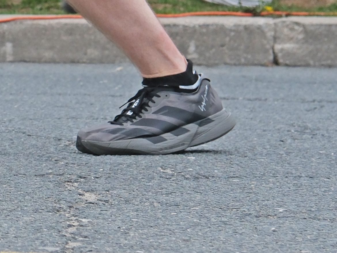 Adidas_Adios_Pro_4_black_on_road_4 Black adidas Adios Pro 4 on the road.