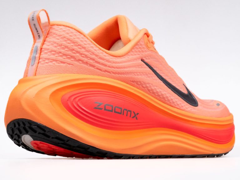 The side profile of the Nike Vomero Plus.