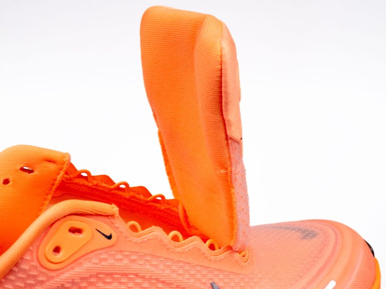 The padded tongue of the Nike Vomero Plus.