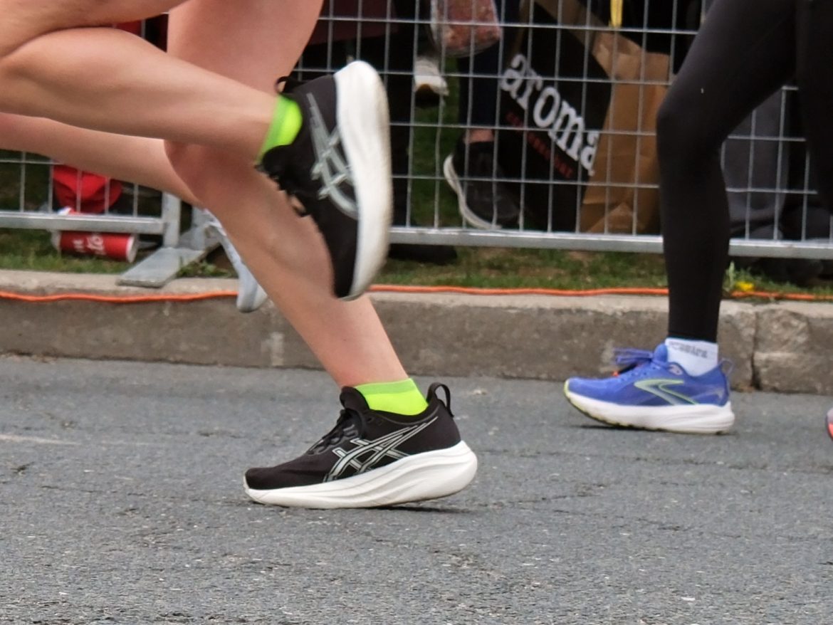 Womens Asics Nimbus 27 on the road.