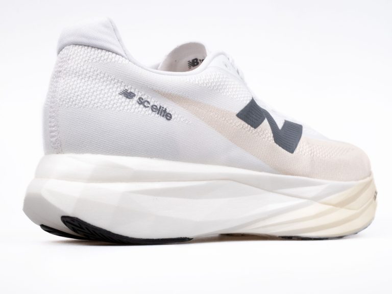 The side view of the New Balance SC Elite V5.