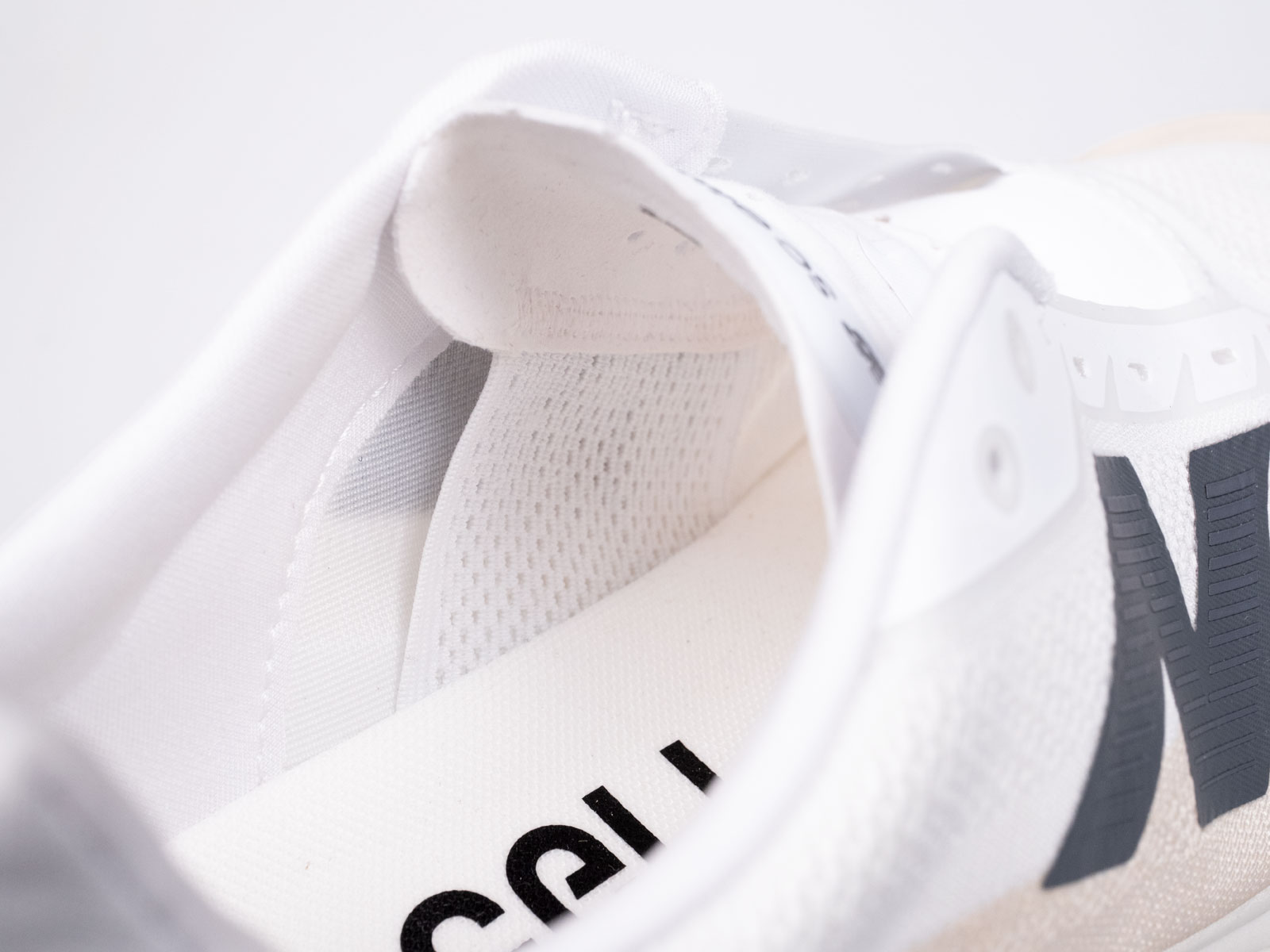 The tongue gusset of the New Balance SC Elite V5.