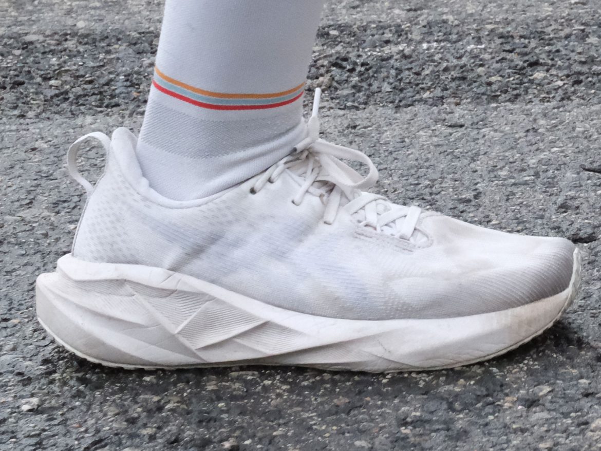 Asics_Novablast_5_white_on_road1 The white Asics Novablast 5 on the road.