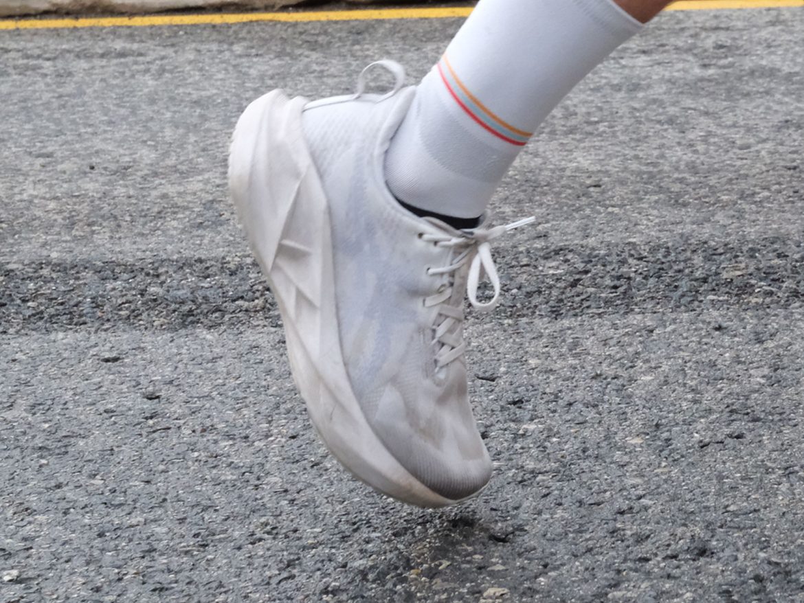 Asics_Novablast_5_white_on_road3 The white Asics Novablast 5 on the road.