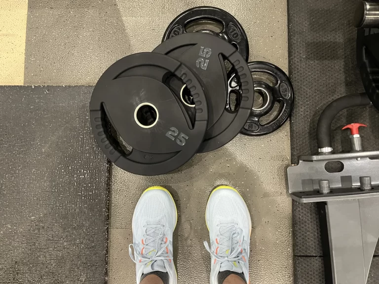 Asics Cumulus 28 with free weights.