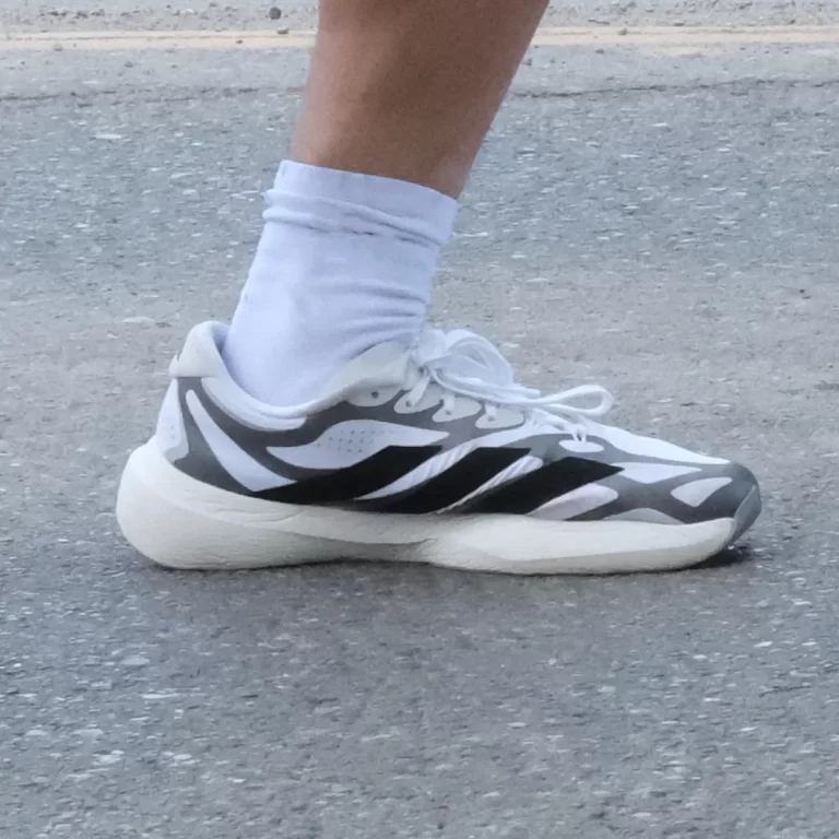 The adidas EVO SL EXO white on the road.