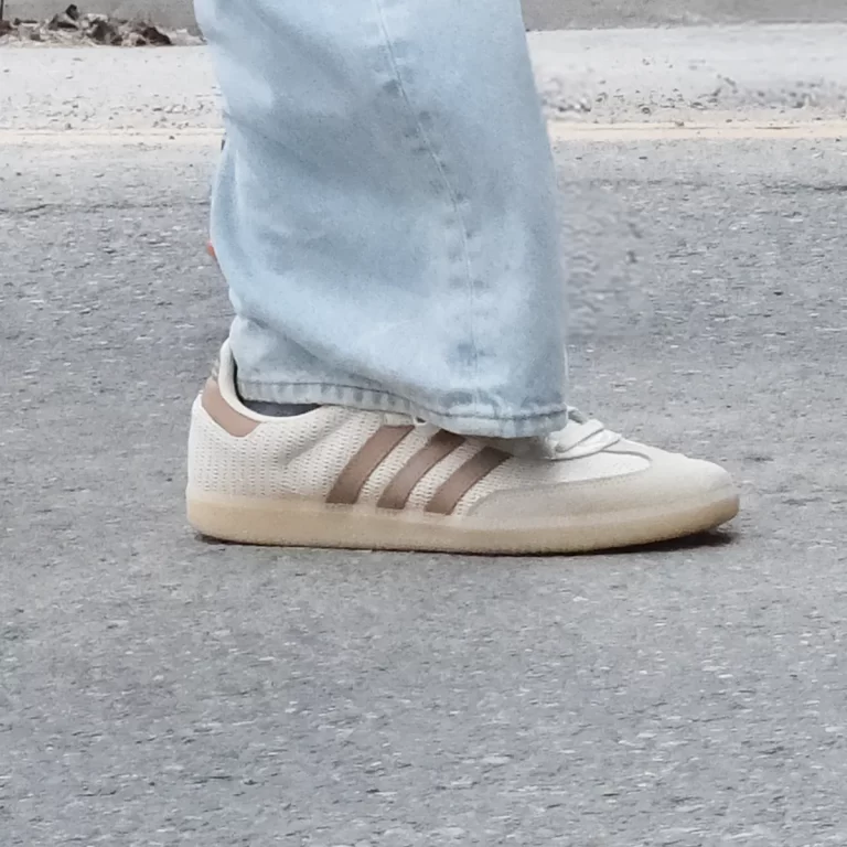The adidas Samba sneaker worn with jeans.
