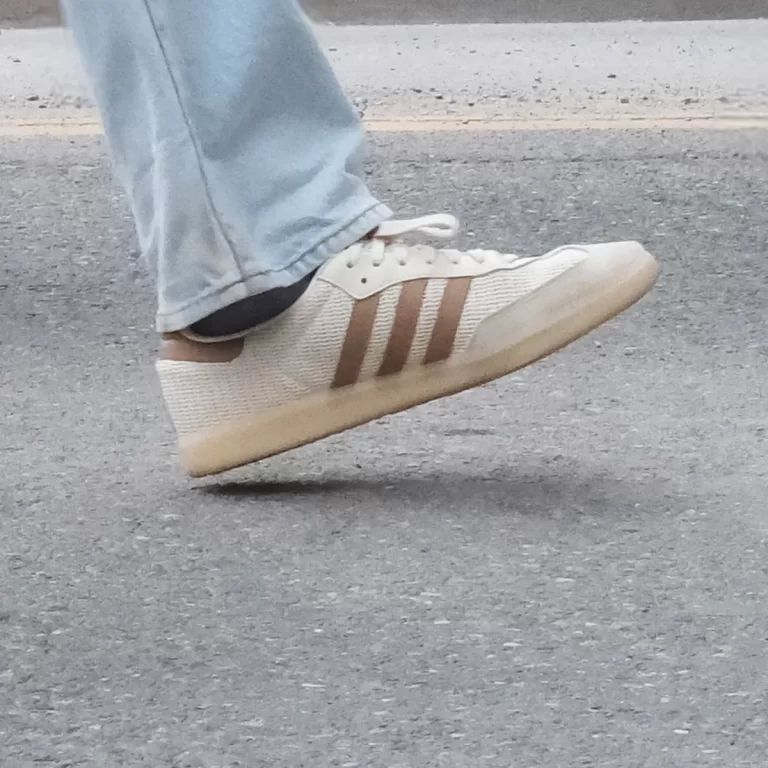 The adidas Samba sneaker worn with jeans.